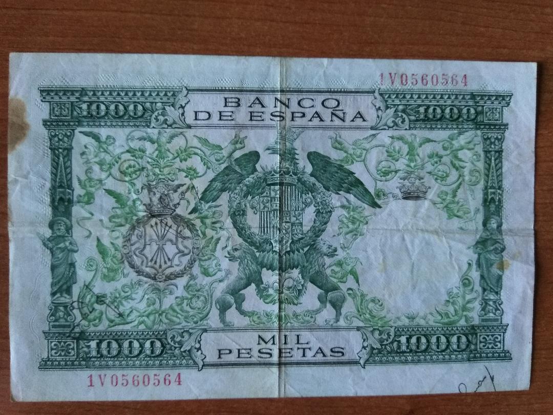 1000 1957 Reverso.jpg