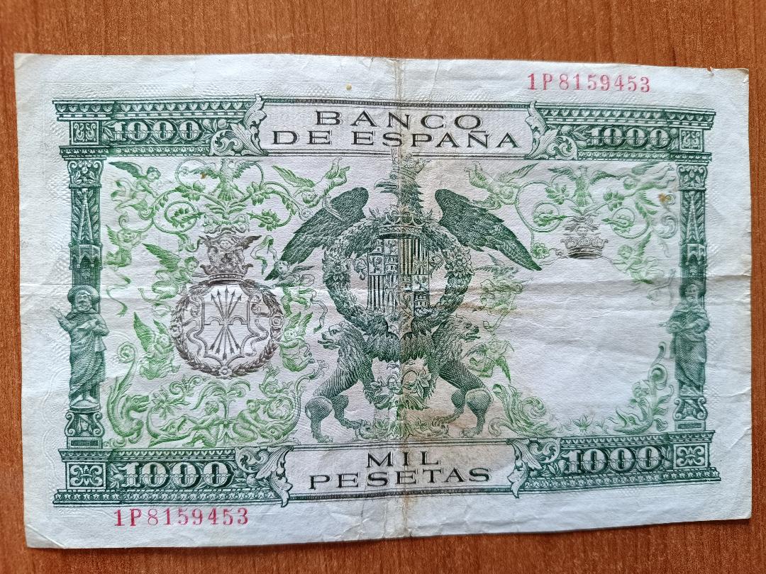 1.000 1957 reverso.jpg